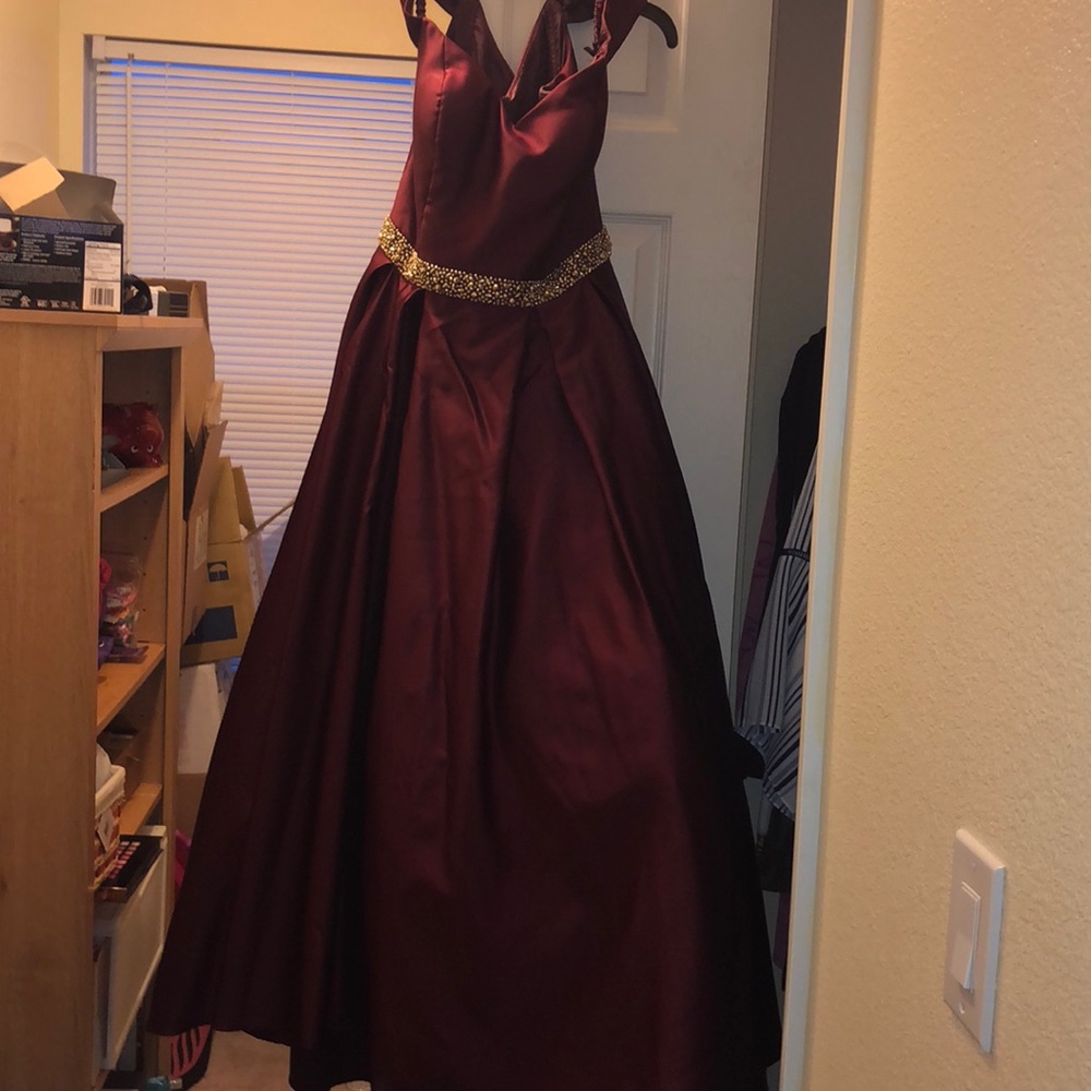 COPY - Long, full off the shoulder burgundy dress…